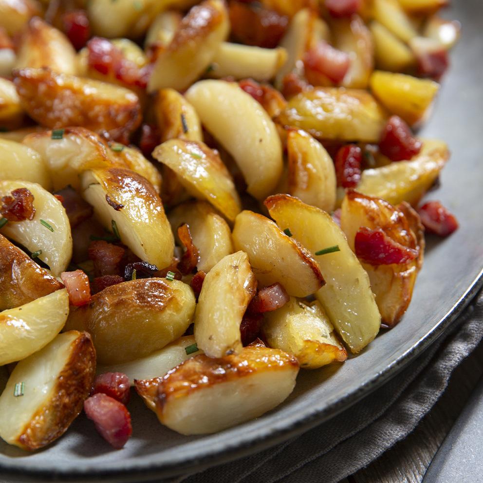 Spicchi di patate al forno con pancetta