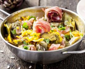 Paella con carciofi e speck